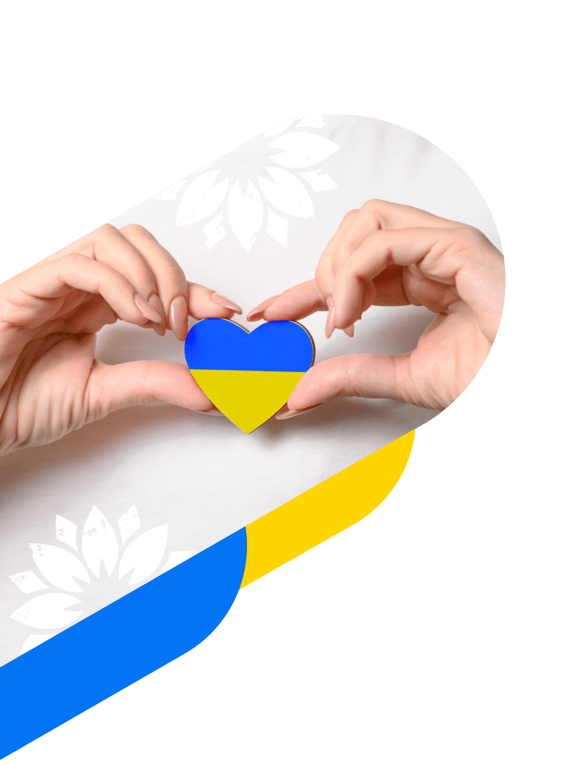 Hands holding heart with colors of Ukrainian Flag